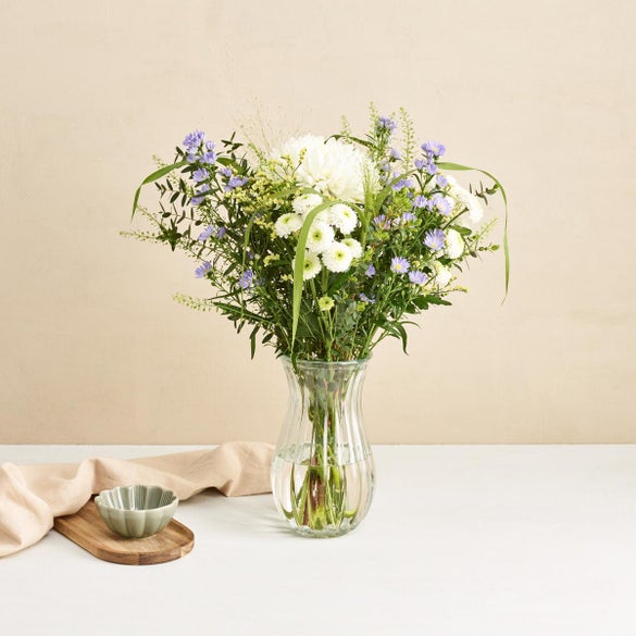 Den fortryllende med vase